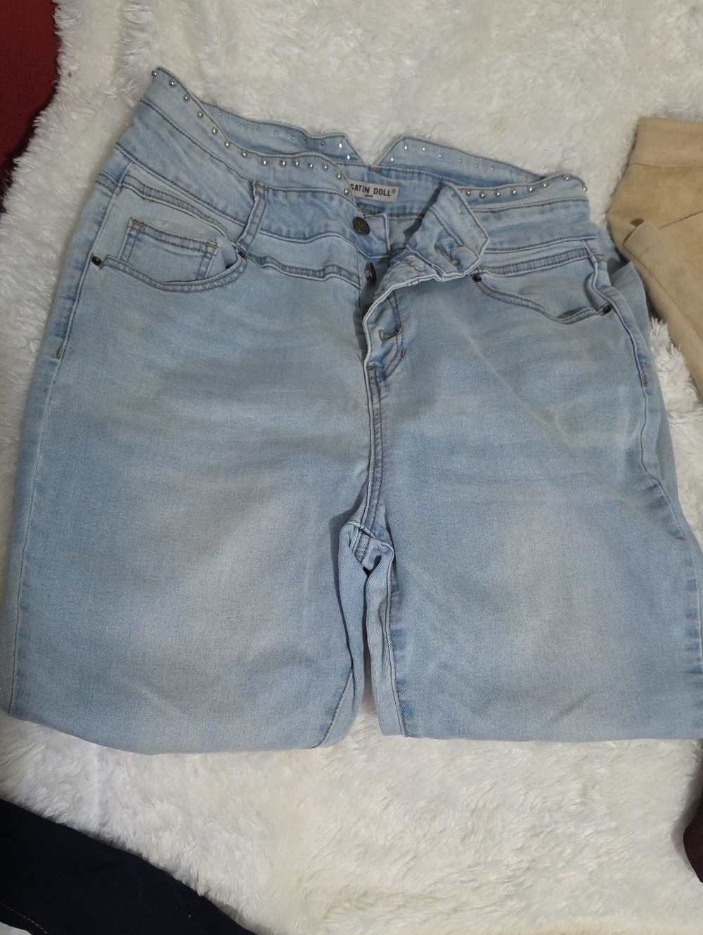 Reverse High-Rise Light Blue Jeans with Studded Waist